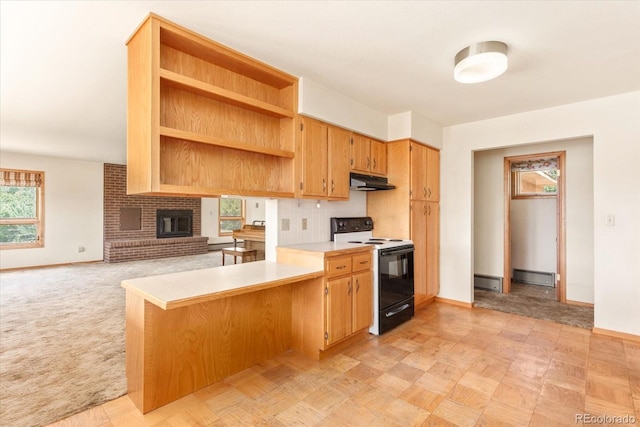 kitchen featuring light colored carpet, kitchen peninsula, a wealth of natural light, and white electric stove