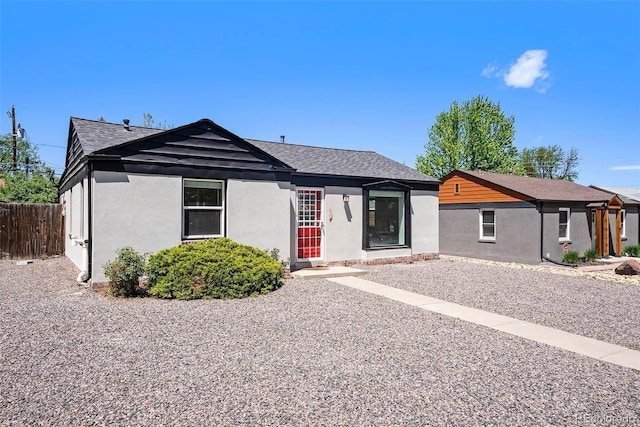 1355 Rosemary St, Denver, CO 80220 - ranch-style home featuring a shingled roof and stucco siding