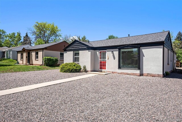 1355 Rosemary St, Denver, CO 80220 - ranch-style home featuring stucco siding and roof with shingles