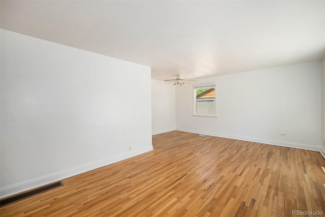 1355 Rosemary St, Denver, CO 80220 - unfurnished room with light wood-type flooring and baseboards
