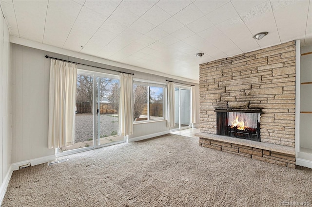 1355 Rosemary St, Denver, CO 80220 - unfurnished living room with carpet floors and a fireplace