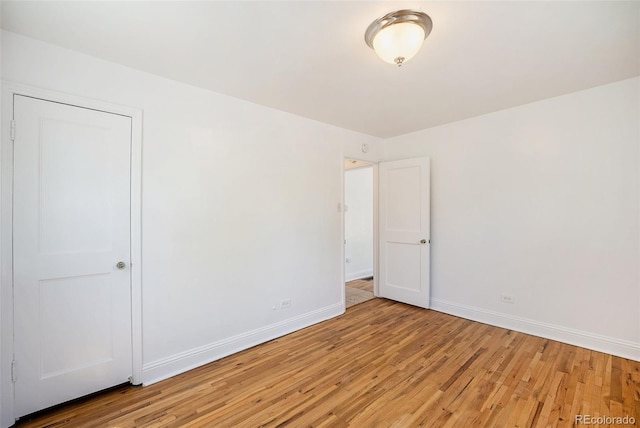 1355 Rosemary St, Denver, CO 80220 - empty room featuring light wood-style flooring and baseboards
