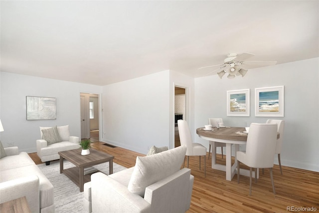 1355 Rosemary St, Denver, CO 80220 - living area with light wood finished floors, baseboards, and ceiling fan