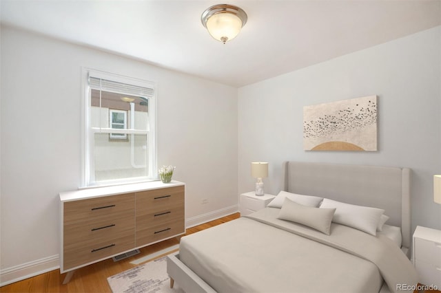 1355 Rosemary St, Denver, CO 80220 - bedroom with wood finished floors and baseboards