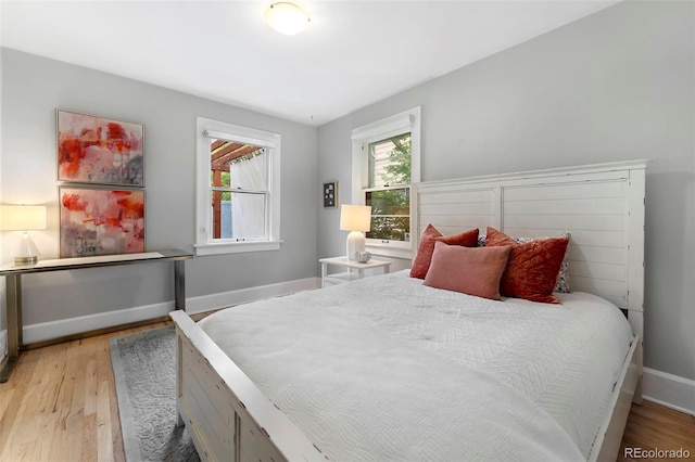 3341 Newton St, Denver, CO 80211 - bedroom featuring light wood-type flooring and baseboards