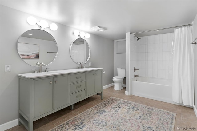 3341 Newton St, Denver, CO 80211 - bathroom with tile patterned floors, toilet, double vanity, shower / bathtub combination with curtain, and baseboards