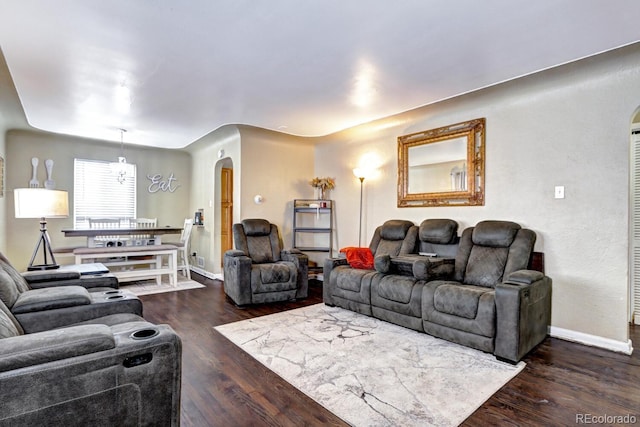 living room featuring dark hardwood / wood-style floors