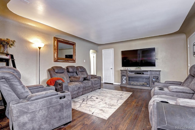 living room with dark wood-type flooring