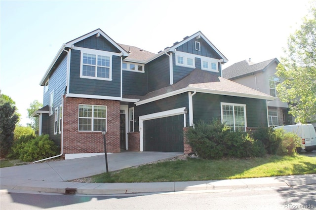 1710 S Poplar St, Denver, CO 80224 - craftsman-style home with brick siding, concrete driveway, board and batten siding, and an attached garage