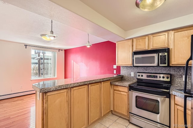 kitchen with a baseboard radiator, kitchen peninsula, backsplash, light wood-type flooring, and appliances with stainless steel finishes