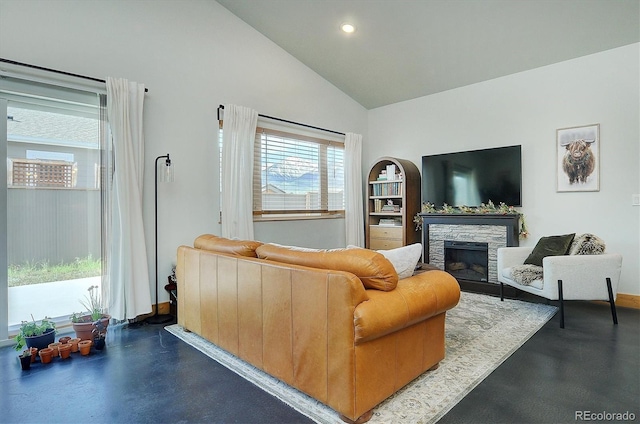 146 Raven Way, Buena Vista, CO 81211 - living room featuring a stone fireplace, high vaulted ceiling, recessed lighting, and baseboards