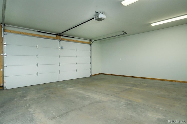 146 Raven Way, Buena Vista, CO 81211 - garage with a garage door opener and baseboards