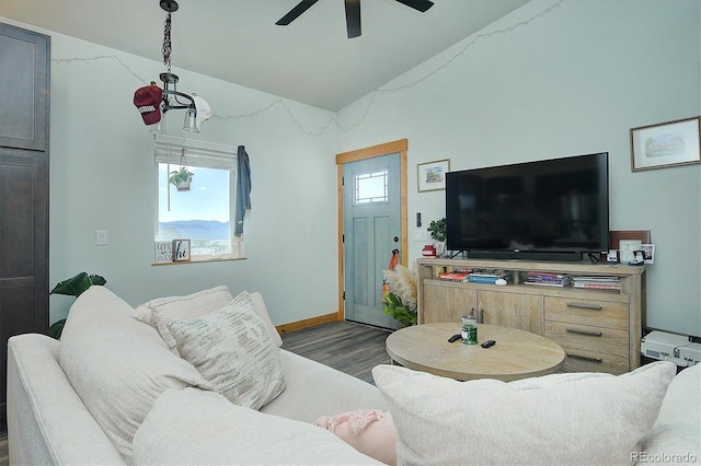 146 Raven Way, Buena Vista, CO 81211 - living area featuring wood finished floors, vaulted ceiling, ceiling fan, and baseboards