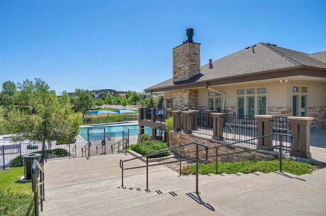 24738 E Layton Pl, Aurora, CO 80016 - community pool with a patio and fence