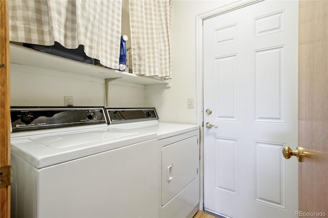 laundry room with washer and clothes dryer