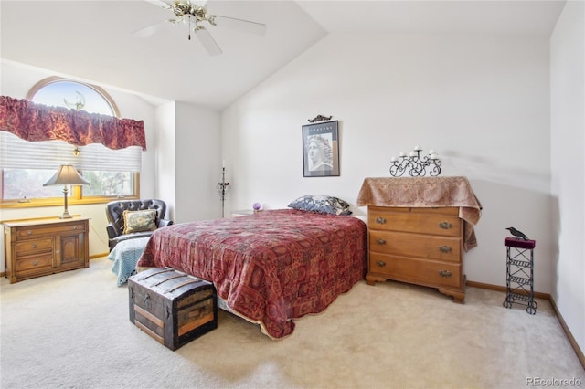 carpeted bedroom featuring vaulted ceiling and ceiling fan