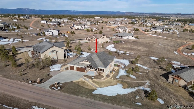 aerial view with a mountain view and a residential view