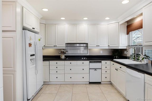 kitchen featuring light tile patterned floors, white appliances, a sink, white cabinetry, and dark countertops