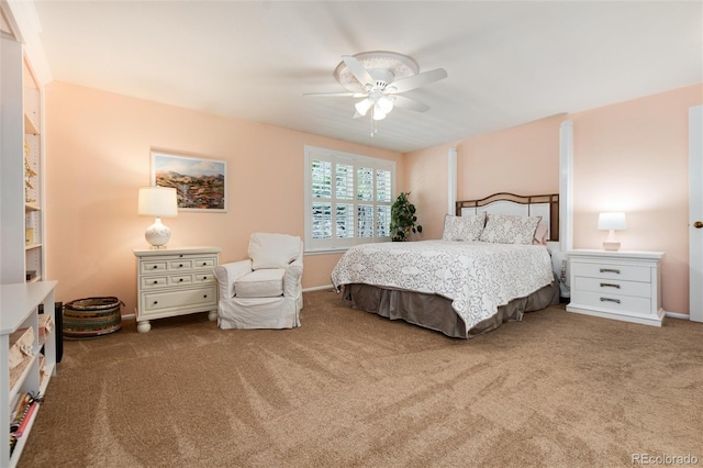 bedroom featuring carpet, a ceiling fan, and baseboards