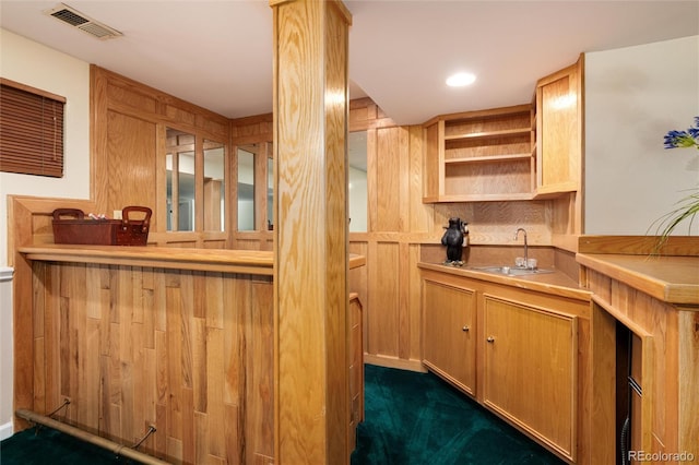 bar with recessed lighting, visible vents, and a sink