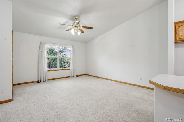 7216 W 18th St, Greeley, CO 80634 - spare room featuring ceiling fan, light carpet, and baseboards