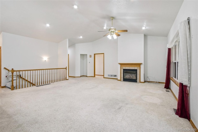 7216 W 18th St, Greeley, CO 80634 - unfurnished living room with carpet, visible vents, baseboards, ceiling fan, and vaulted ceiling