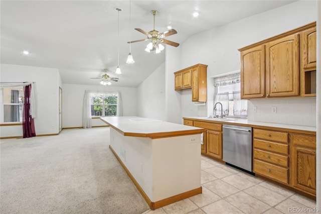 7216 W 18th St, Greeley, CO 80634 - kitchen with a sink, vaulted ceiling, ceiling fan, light countertops, and stainless steel dishwasher