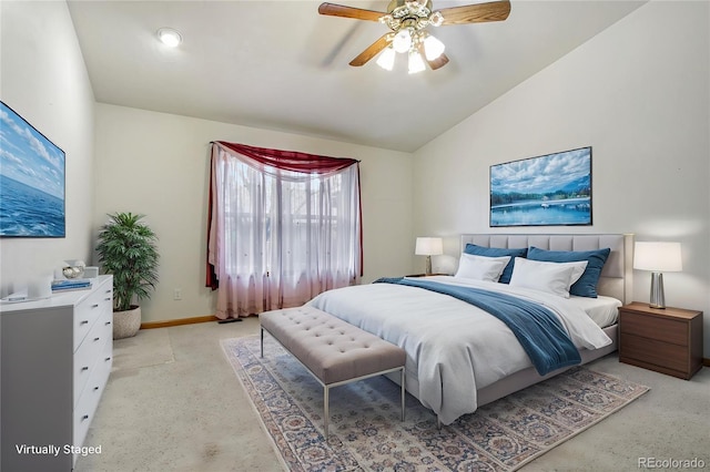 7216 W 18th St, Greeley, CO 80634 - bedroom featuring lofted ceiling, light carpet, baseboards, and a ceiling fan
