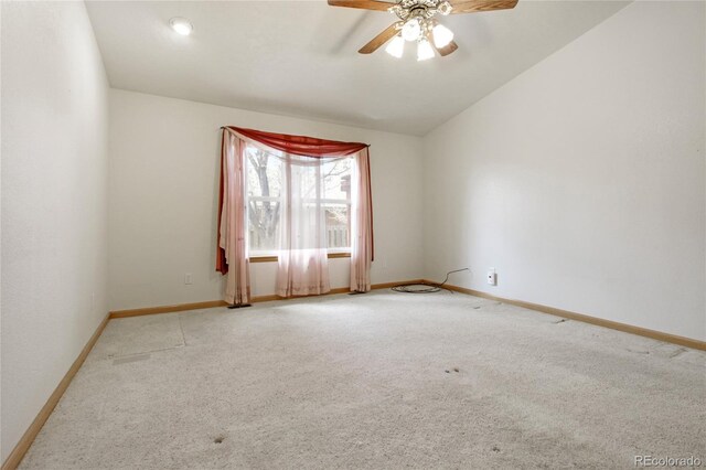 7216 W 18th St, Greeley, CO 80634 - spare room with vaulted ceiling, baseboards, a ceiling fan, and carpet floors