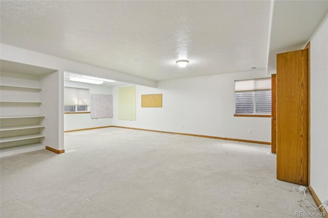7216 W 18th St, Greeley, CO 80634 - finished below grade area featuring baseboards and light carpet