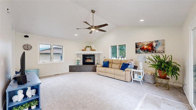 10886 Pheasant Run, Littleton, CO 80125 - living area with a ceiling fan, carpet floors, a glass covered fireplace, lofted ceiling, and baseboards
