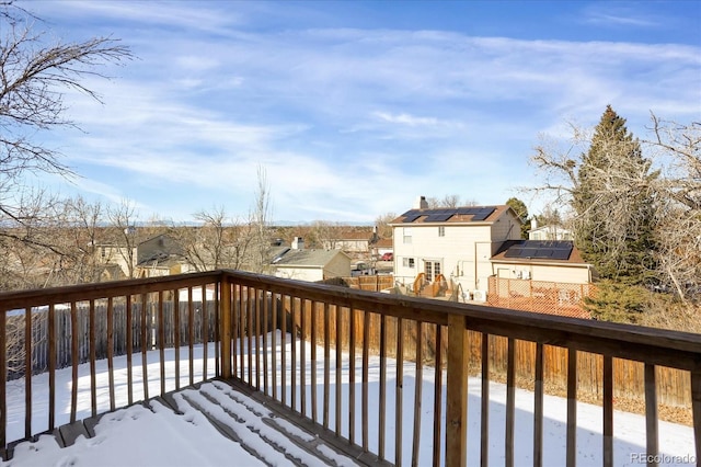 view of snow covered deck