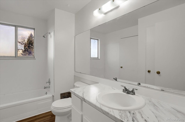 16651 E Arizona Pl, Aurora, CO 80017 - full bath with vanity, shower / bath combination, and wood finished floors