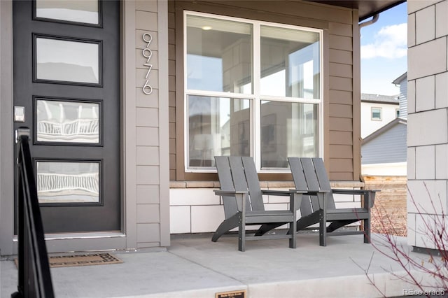 property entrance featuring a patio