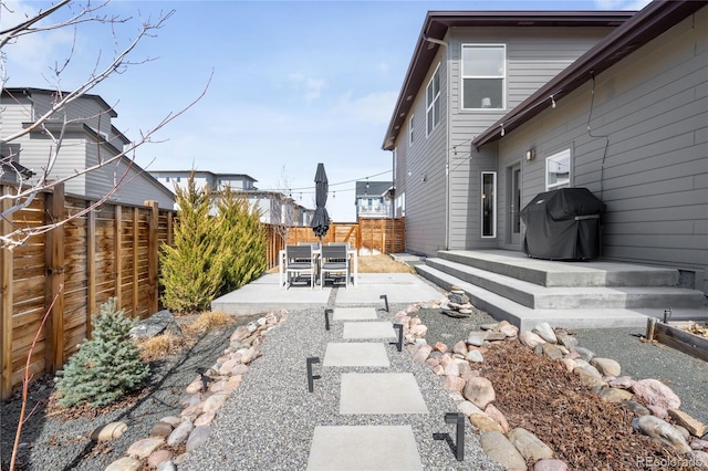 view of yard featuring a fenced backyard and a patio