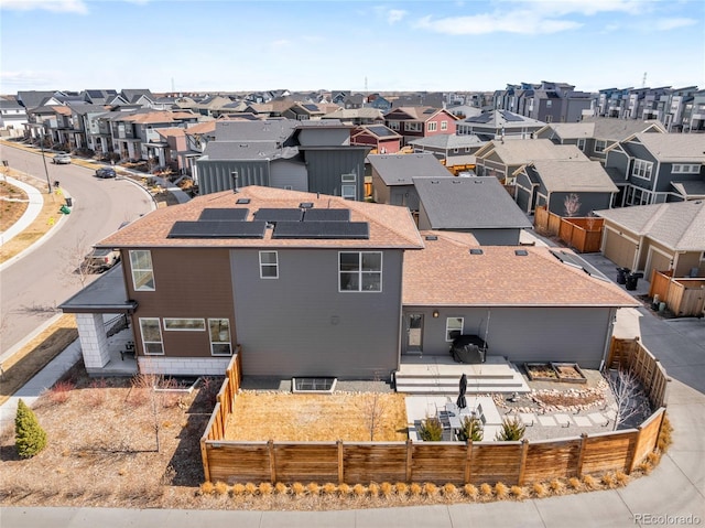 drone / aerial view with a residential view