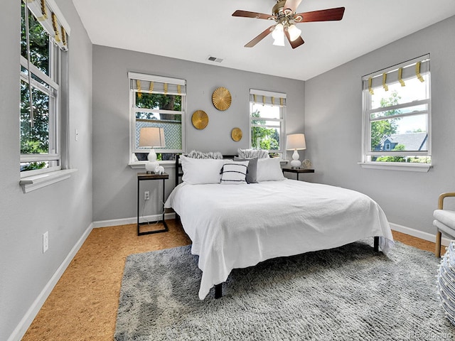 3282 Depew St, Wheat Ridge, CO 80212 - carpeted bedroom with baseboards and ceiling fan