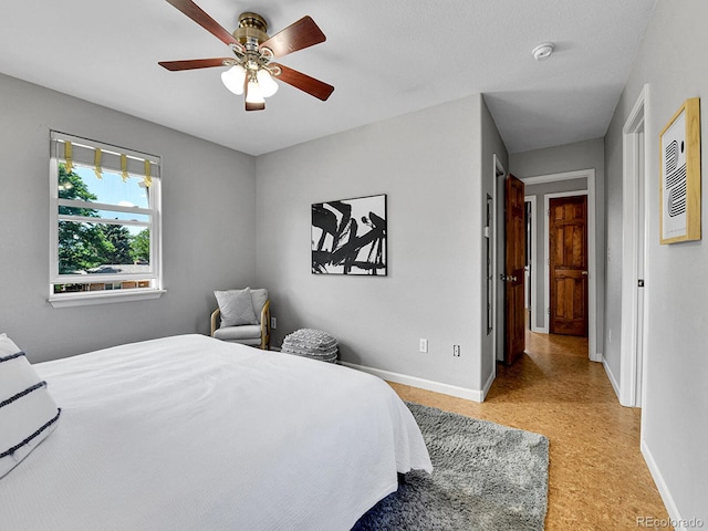 3282 Depew St, Wheat Ridge, CO 80212 - bedroom featuring baseboards and a ceiling fan