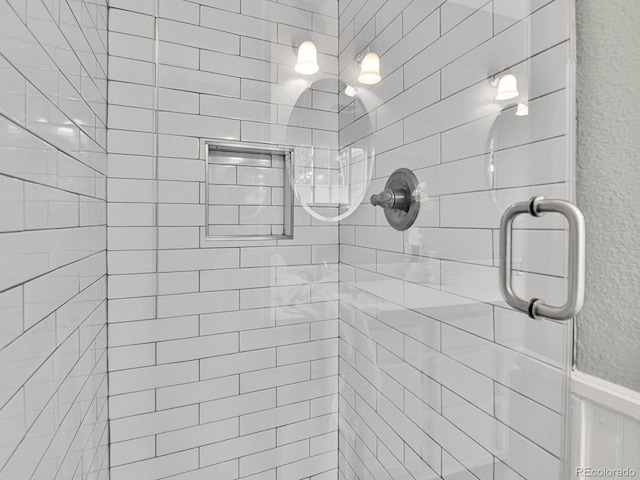 3282 Depew St, Wheat Ridge, CO 80212 - full bathroom featuring a stall shower and a textured wall