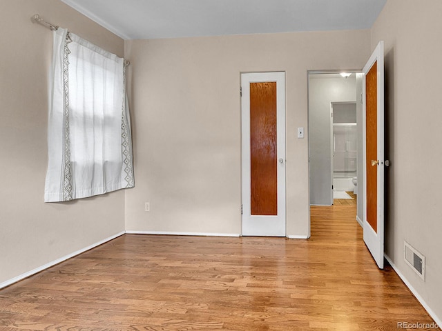 3282 Depew St, Wheat Ridge, CO 80212 - unfurnished bedroom with wood finished floors and baseboards
