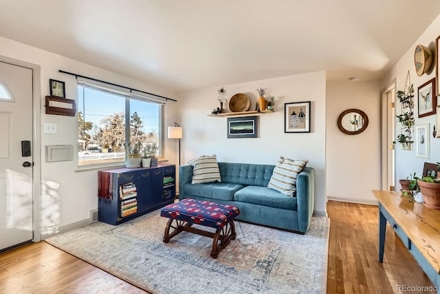 living room with hardwood / wood-style floors