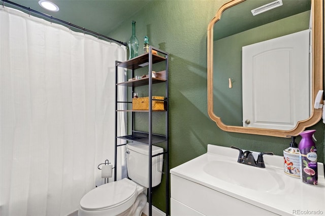 599 Fall River Ct, Brighton, CO 80601 - full bath with vanity, a textured wall, a shower with curtain, and recessed lighting