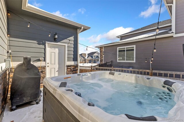 599 Fall River Ct, Brighton, CO 80601 - wooden terrace with a hot tub