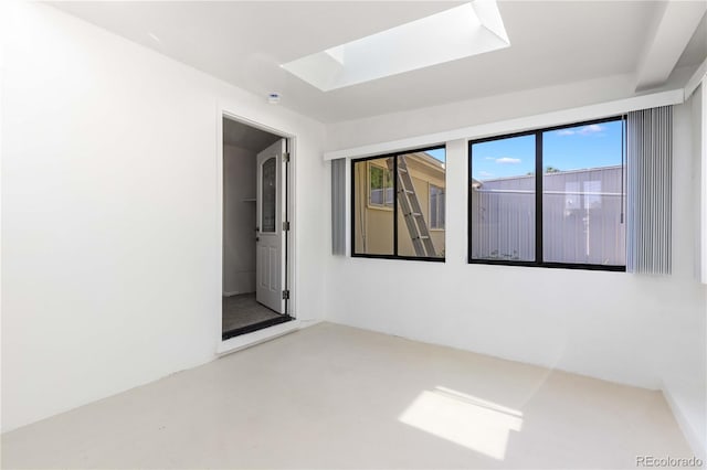 3955 S Hazel Ct, Englewood, CO 80110 - unfurnished room featuring a skylight