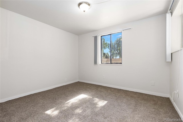 3955 S Hazel Ct, Englewood, CO 80110 - empty room with carpet flooring