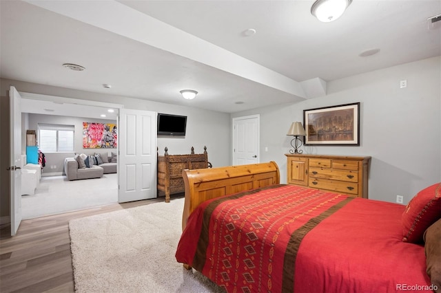 bedroom featuring hardwood / wood-style flooring