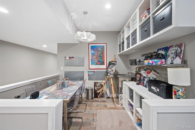 office with light hardwood / wood-style flooring