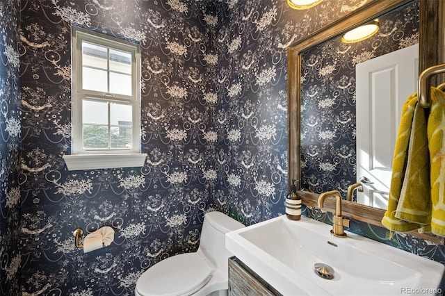 bathroom with vanity and toilet