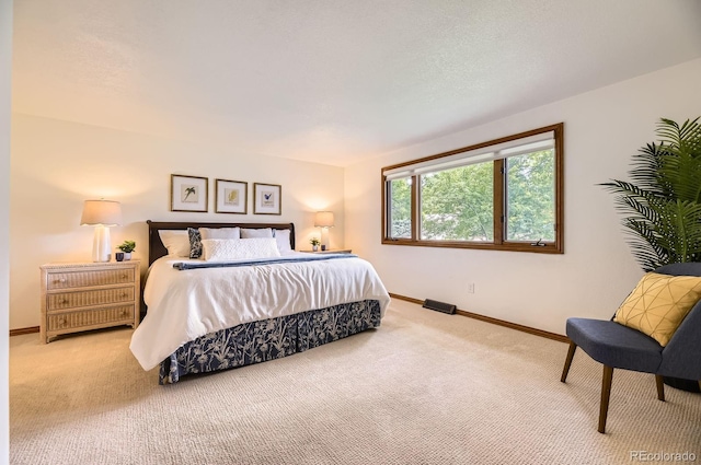 5475 W Ottawa Ave, Littleton, CO 80128 - carpeted bedroom with baseboards