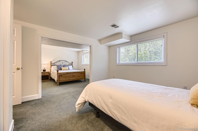 5475 W Ottawa Ave, Littleton, CO 80128 - carpeted bedroom with baseboards
